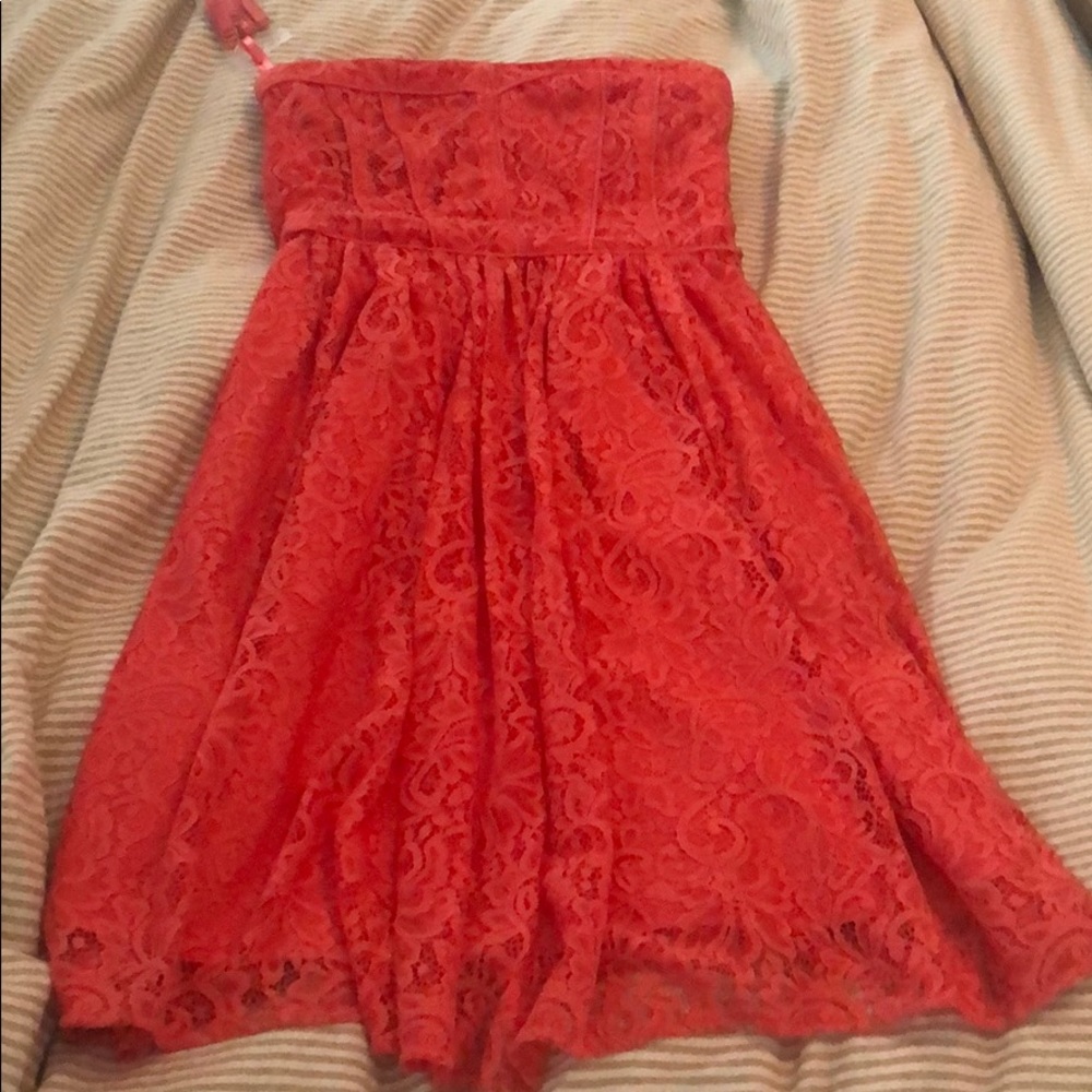 Eva Mendes Coral Strapless dress